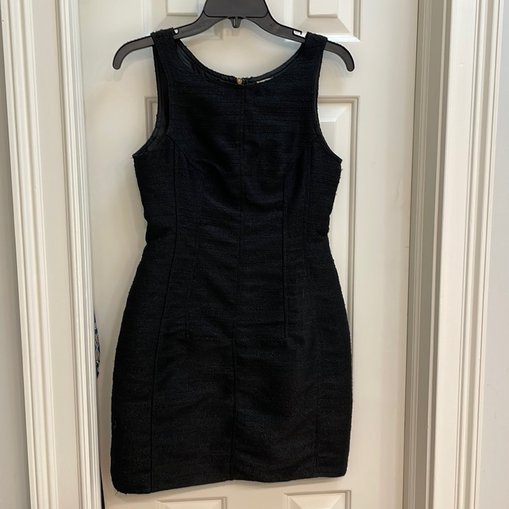 Short black sleeveless dress